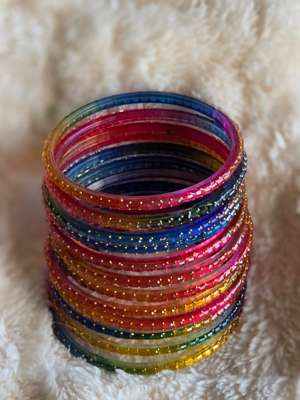 Cut glass bangles in a rainbow mix